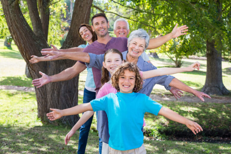 A Family Posing Together in the Park