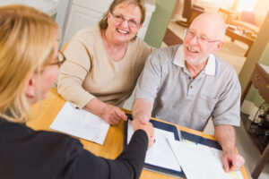 Senior Adult Couple Going Over Documents